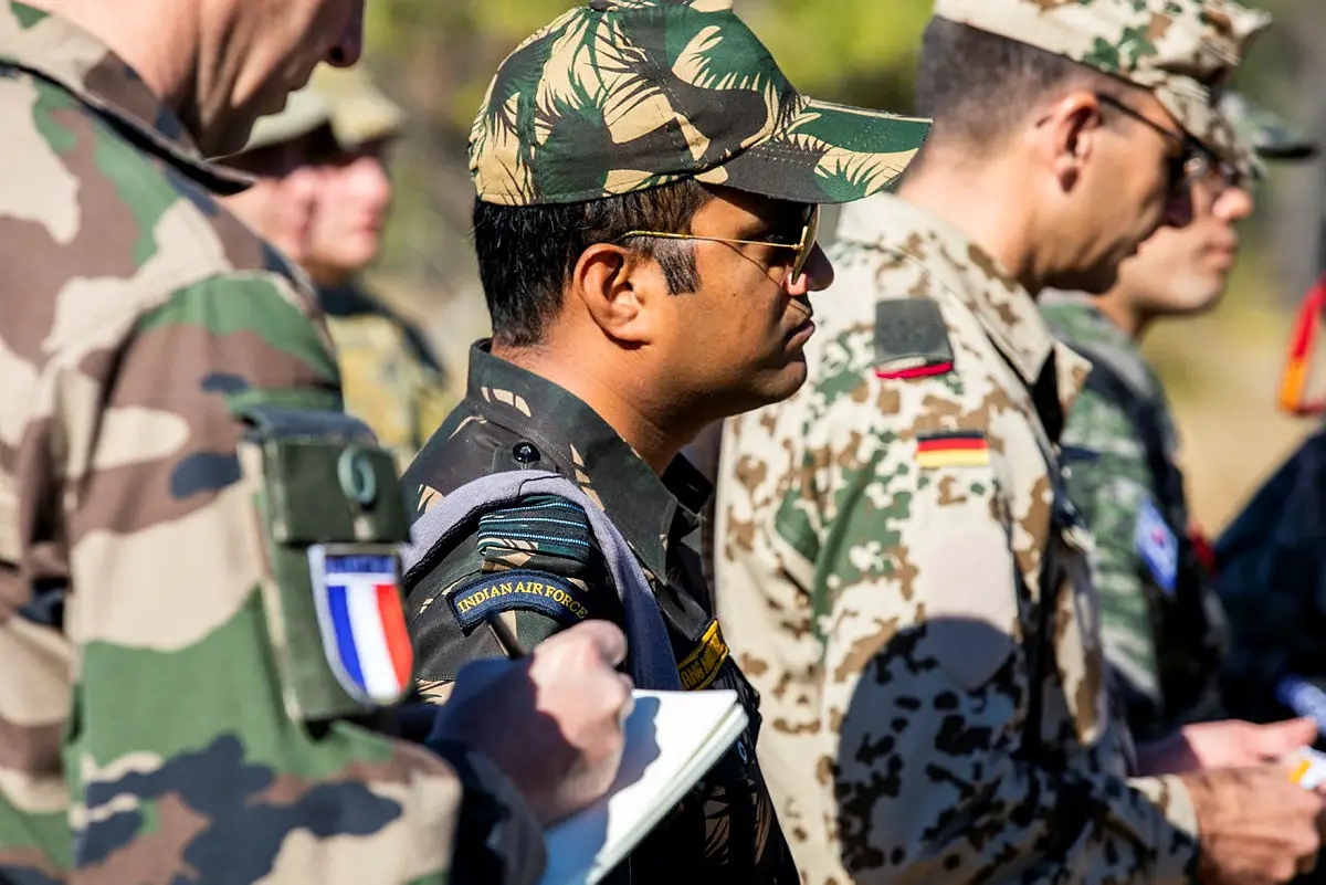French Armed Forces Army officer Lieutenant Colonel Guillaume Bevillard, Indian Armed Forces Air Force officer Squadron Leader Umand Nautiyal and German Armed Forces Army officer Lieutenant Colonel Alois Wagner, during a tour of the Townsville Field Training Area for International Observers, on Talisman Sabre 2021.