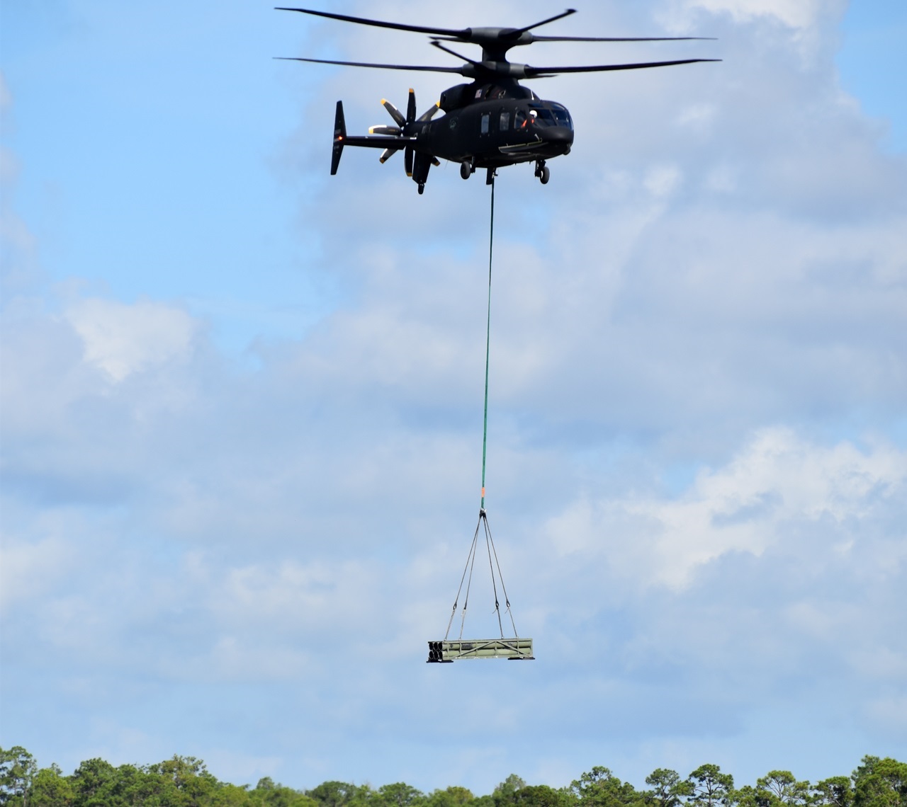  Sikorsky-Boeing SB>1 DEFIANT Helicopter Flexes Its Muscle-lifting 5,300 Pounds