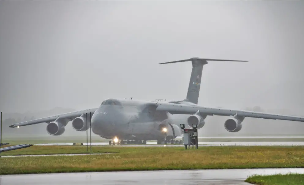 An Air Force C-5M Super Galaxy and aircrew from Dover Air Force Base, Del., carrying Soldiers with the 3rd Brigade Combat Team, 10th Mountain Division of Fort Polk, La., taxies on the runway July 7, 2021, as part of an Emergency Deployment Readiness Exercise (EDRE) at Volk Field, Wis.