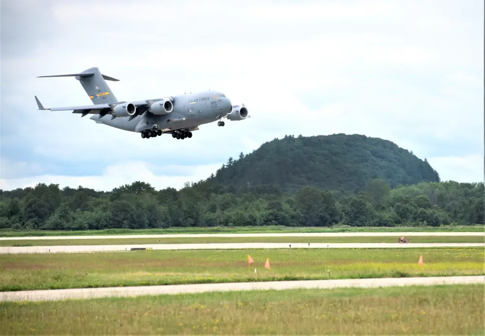 An Air Force C-17 Globemaster III from Joint Base Charleston, S.C., carrying Soldiers with the 3rd Brigade Combat Team, 10th Mountain Division of Fort Polk, La., prepares to land July 7, 2021, as part of an Emergency Deployment Readiness Exercise (EDRE) at Volk Field, Wis.