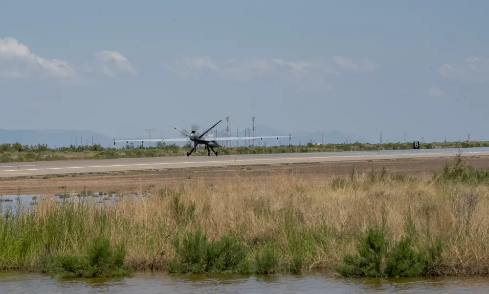 An MQ-9 Reaper from Creech Air Force Base, Nevada, prepares to take off from Holloman AFB, New Mexico, July 8, 2021. This is the first time an MQ-9 arrive at HAFB from a different base using a new automated landing and takeoff system without an aircrew.