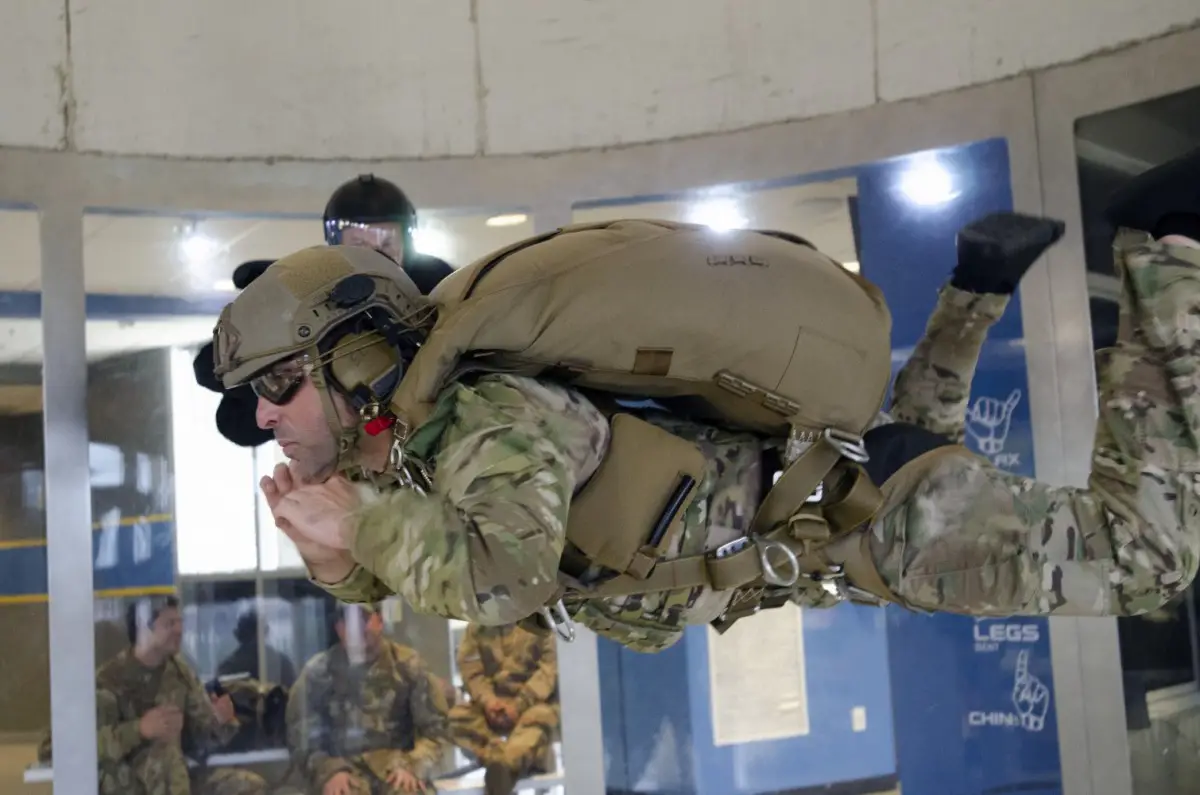 A 3rd Special Forces Group operational Soldier undergoes vertical wind tunnel training prior to live airdrop of the Parachutist Flotation Device (PDF). 