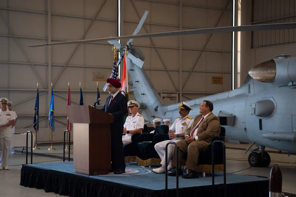 Ambassador Taranjit Singh Sandhu, Indian Ambassador to the U.S., delivers remarks during a ceremony in which the Indian Navy inducted its first two MH-60R Seahawks from the U.S. Navy at Naval Air Station North Island on Friday, July 16.