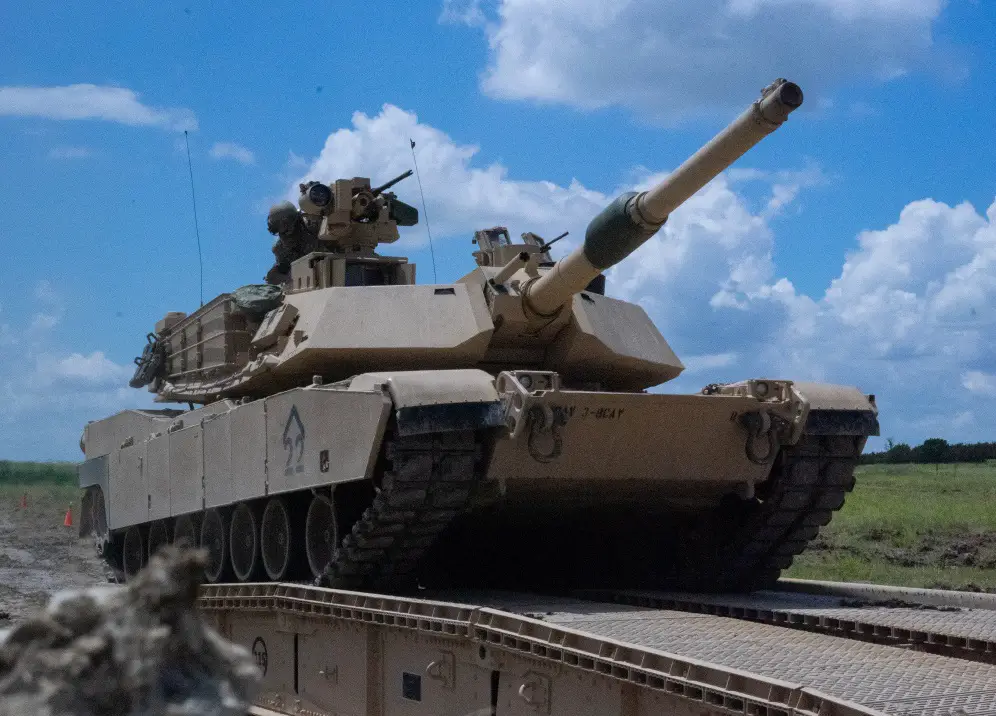 Tankers with 3rd Battalion, 8th Cavalry Regiment, 3rd Armored Brigade Combat Team, 1st Cavalry Division, trek over a Joint Assault Bridge (JAB) in their M1A2 SEPv3 Abrams Main Battle Tank during a combined arms breach exercise, Fort Hood, Texas, June 6, 2021. 