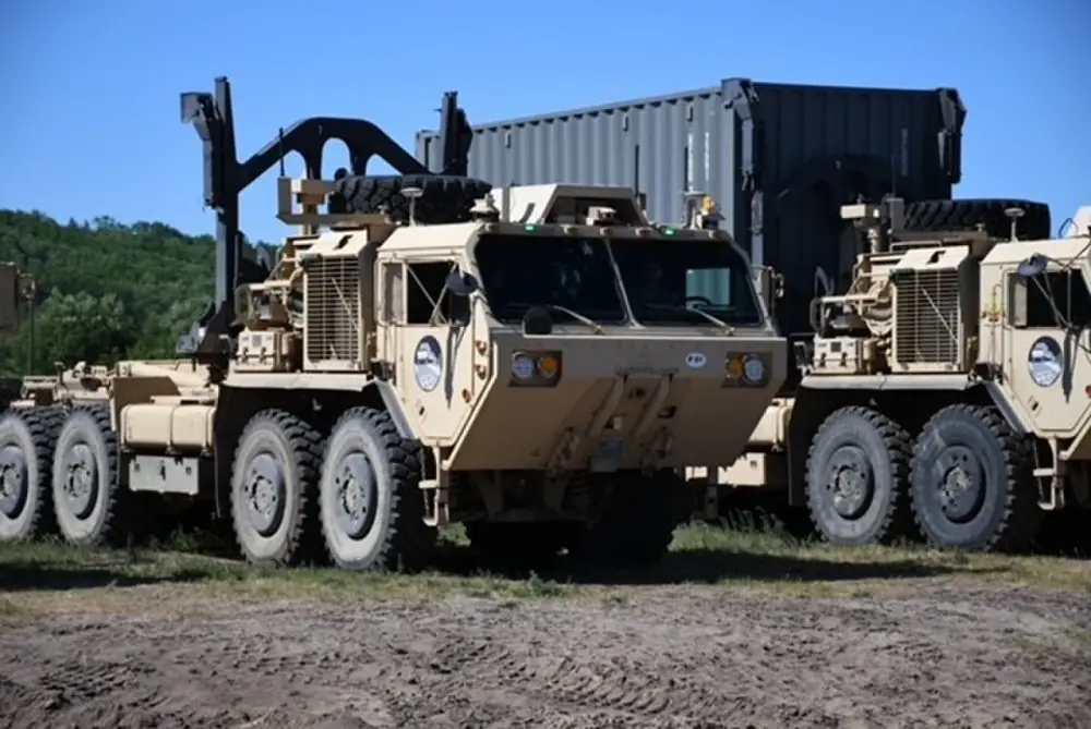 Expedient Leader-Follower trucks at Camp Grayling, Michigan, have been loaded with autonomous technology by U.S. Army engineers and technicians. The trucks are being tested to ensure they can be operated unmanned.
