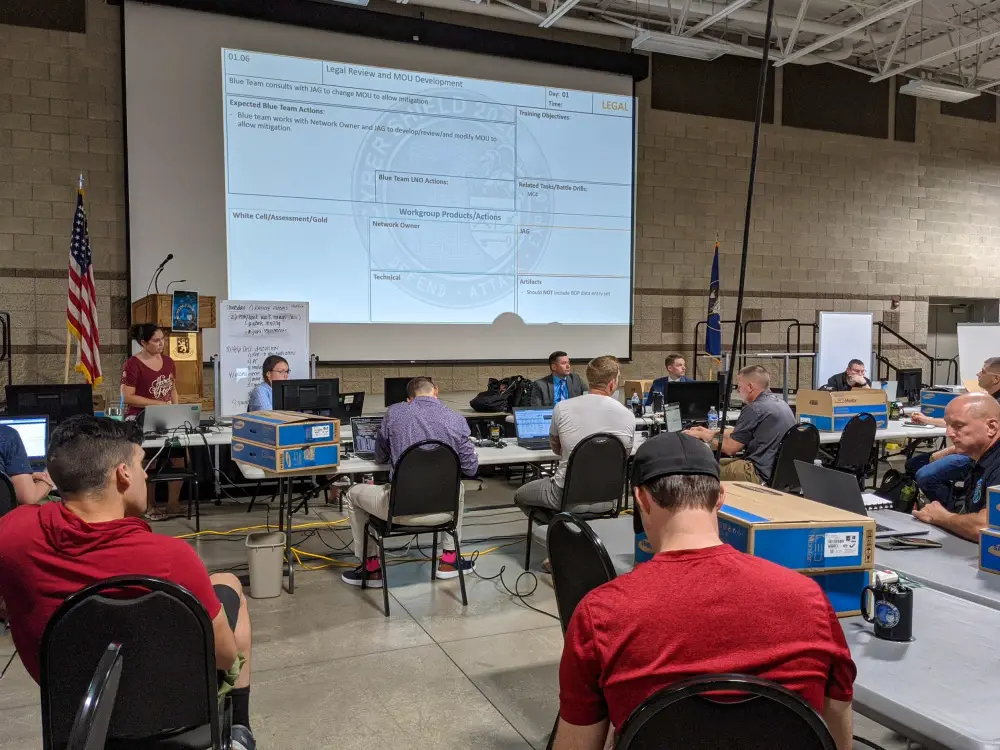 Cyber defense professionals with the ADVON (Advanced Echelon) team for Cyber Shield 21 hold preliminary meeting in the 640th Regiment, Regional Training Institute at Camp Williams, UT, on July 8, 2021.
