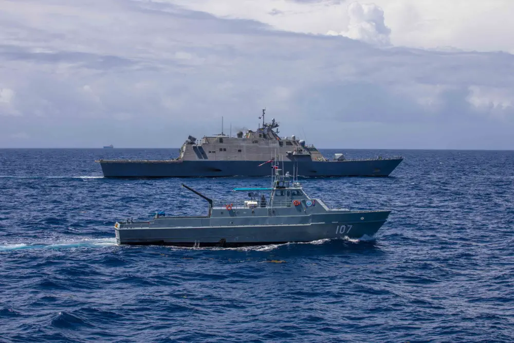 The Freedom-variant littoral combat ship USS Billings (LCS 15) conducts a passing exercise (PASSEX) with Dominican Republic Navy Swiftship-110'-class patrol boat Canopus (GC 107) and Justice Boston whaler-class boat Nunke (LI 163), July 10, 2021.