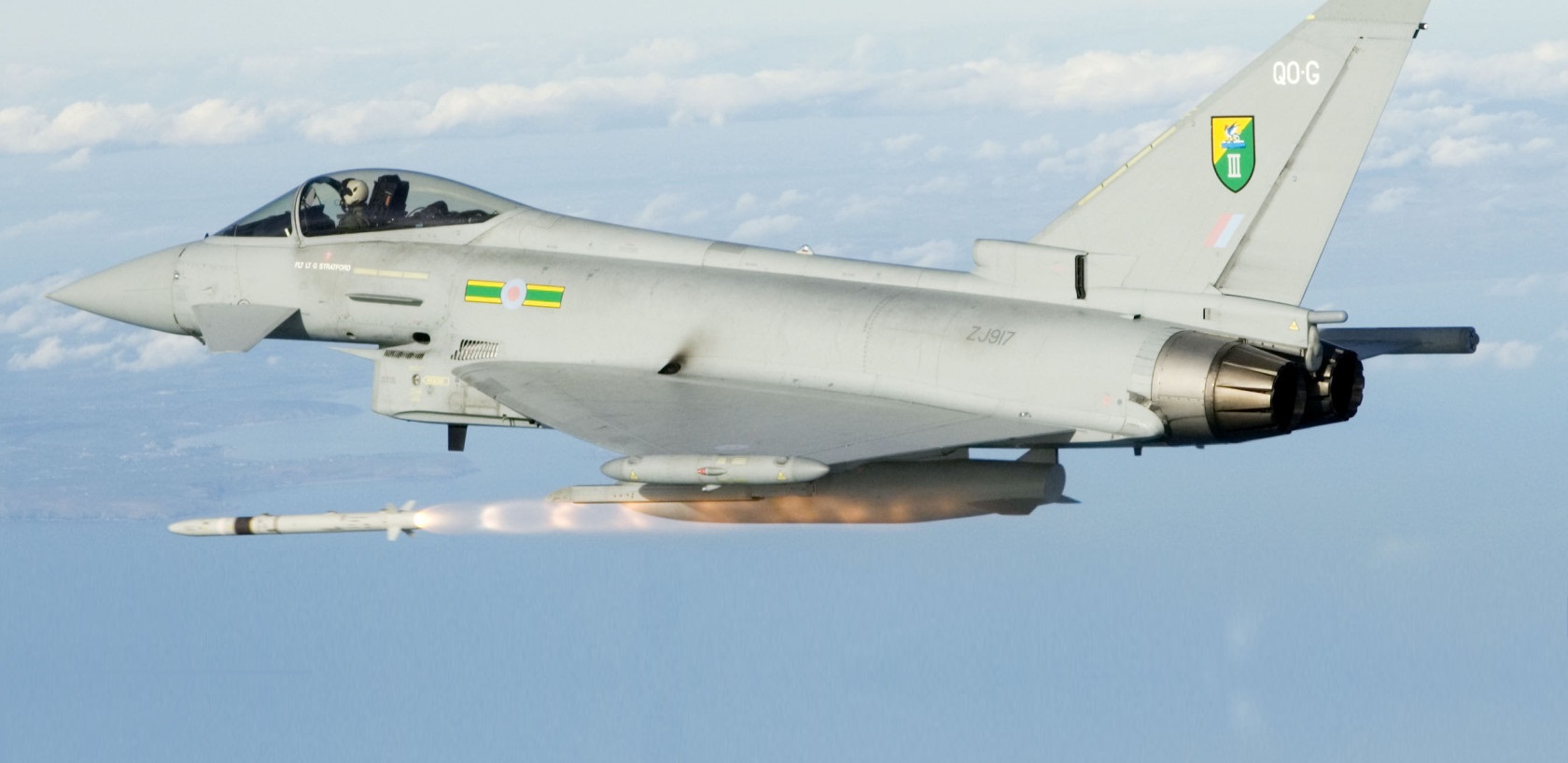 Eurofighter Typhoon based at RAF Coningsby, Lincoln, England firing a MBDA ASRAAM missile. The missile is fired against the flare pack towed by a Mirach target drone and was fired at the Aberporth range in Cardigan Bay, Wales. The Pilot firing the missile was Flt Lt B Cooper of 3(F) Squadron and the chase aircaft was flown by Flt Lt Sally Cronin of 100 Squadron RAF Leeming.