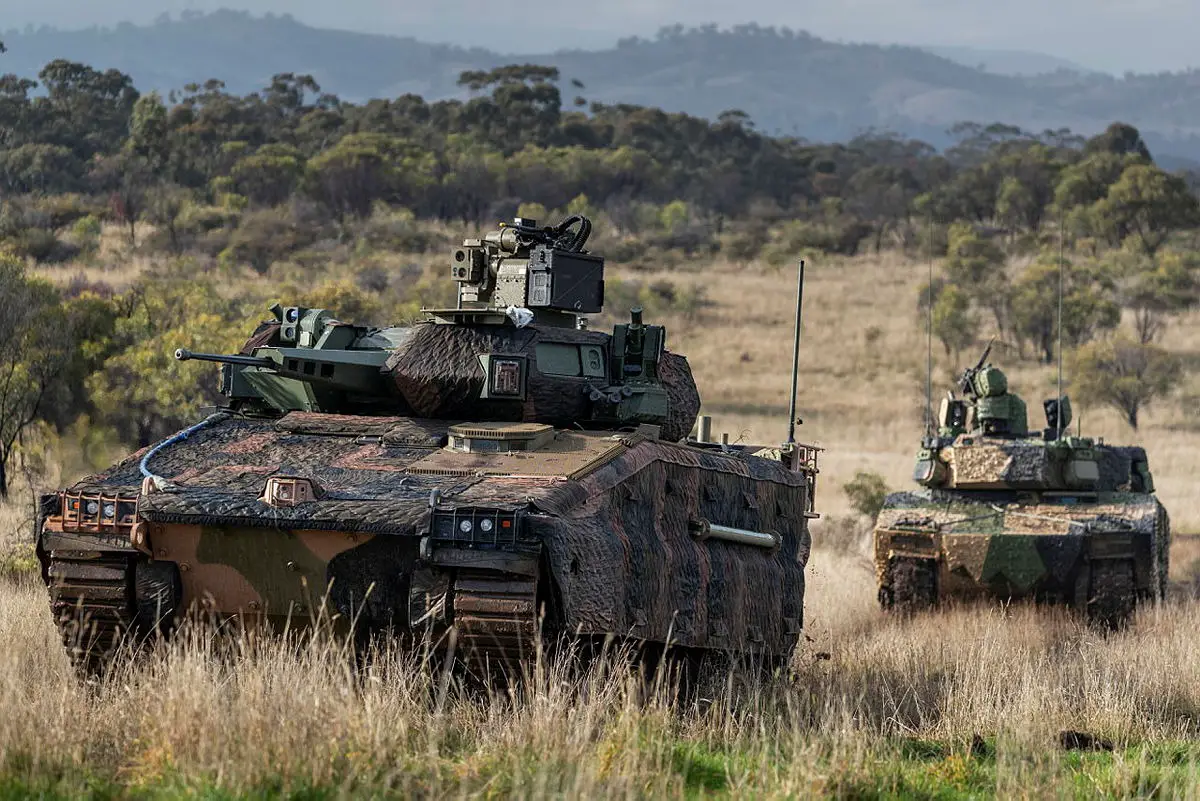 Hanwha Defense Australia Redback Infantry Fighting Vehicle (front) and Rheinmetall Defence Australia LYNX KF41 Infantry Fighting Vehicle (back), conduct LAND 400 Phase 3 user evaluation trials at Puckapunyal Military Area, Victoria.