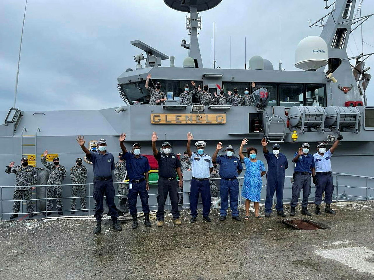 HMAS Glenelg's Ship's Company with Vanuatu Police Maritime Wing staff alongside Port Vila, Vanuatu during Operation ISLAND CHIEF 21.
