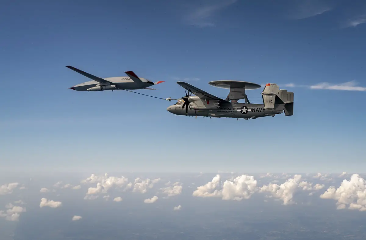 An MQ-25 Stingray unmanned aerial vehicle refuels an E-2D Advanced Hawkeye aircraft over MidAmerica Airport in Mascoutah, Ill., Aug. 18, 2021. 