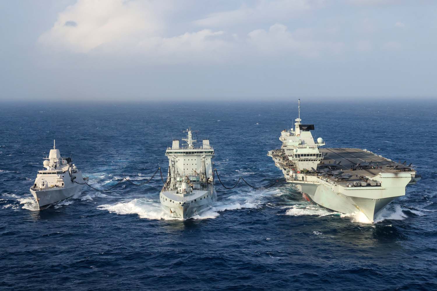 HNLMS Evertsen, RFA Tidespring and HMS Queen Elizabeth to conduct a double replenishment at sea.