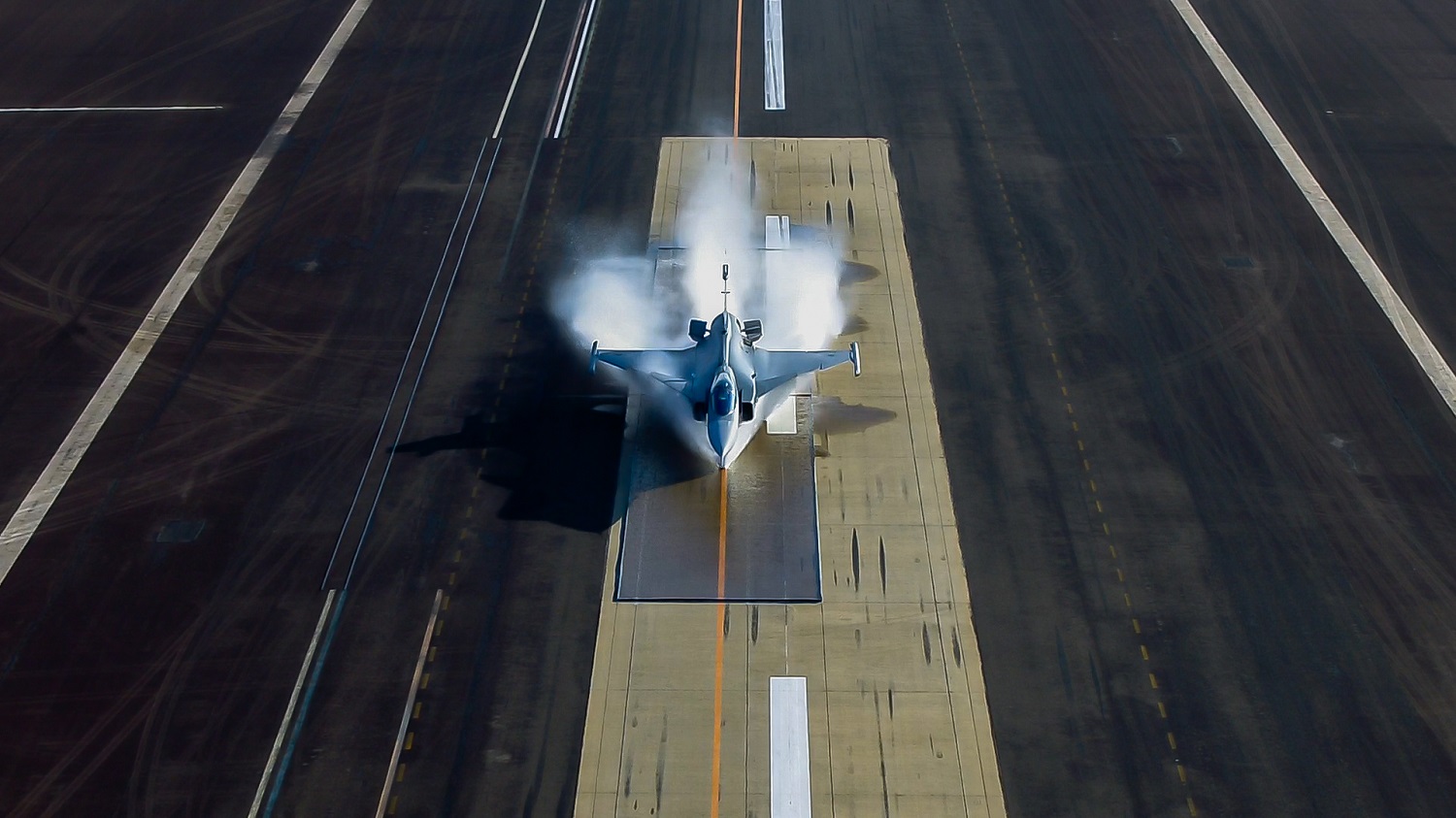 Saab Conducts Water Spray Test With Gripen E Fighter at Gripen Flight Test Centre, Brazil