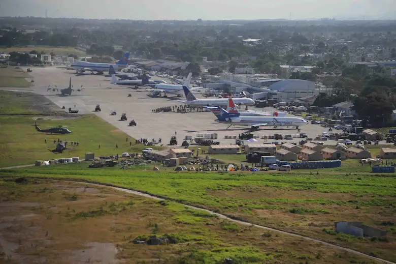 Airplanes wait for off-load to support in earthquake relief efforts at the Port-au-Prince International Airport.