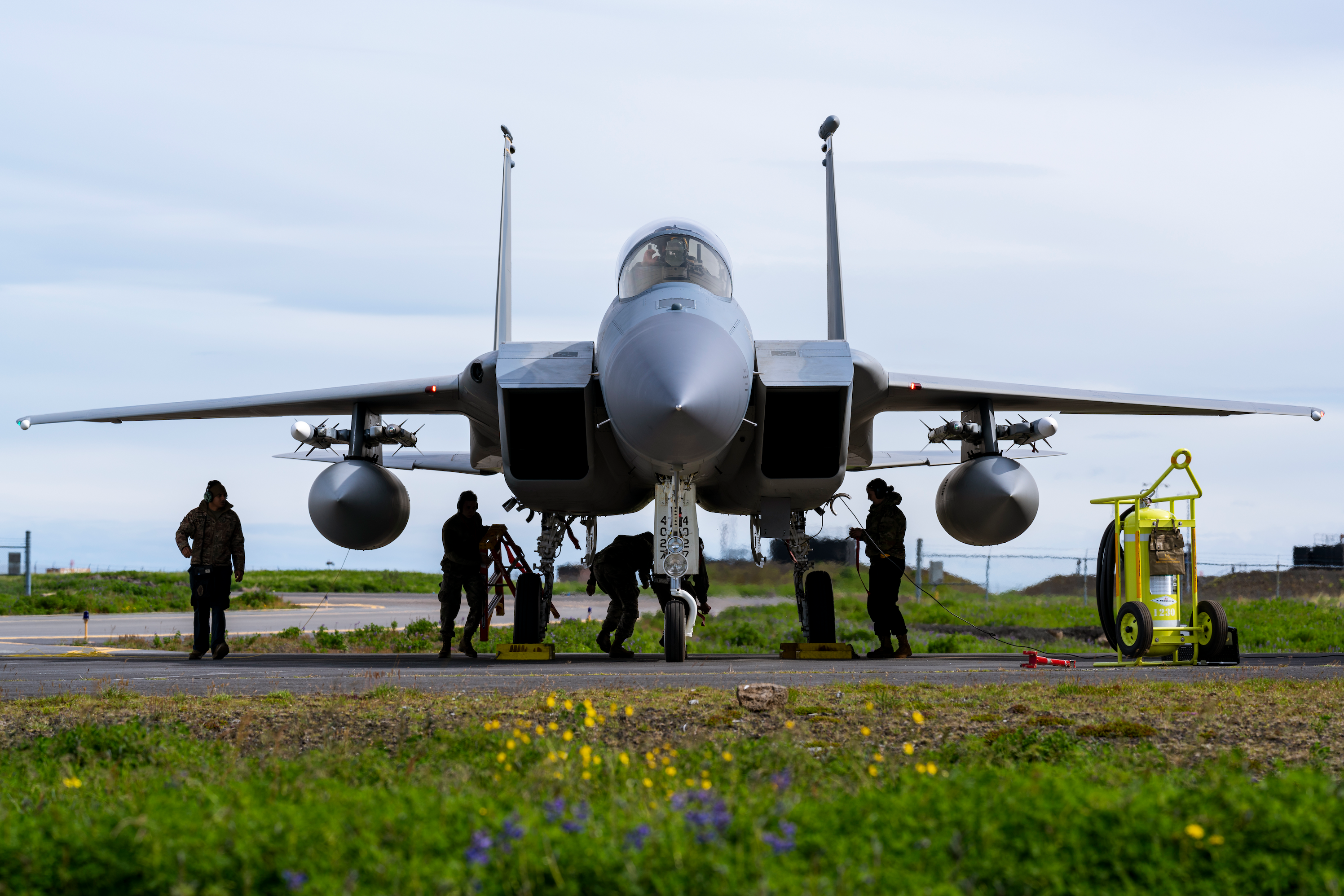 U.S. Air Force maintenance personnel assigned to the 48th Fighter Wing attend to an F-15C Eagle during NATO Air Policing Operations at Keflavik Air Base, Iceland, July 27, 2021. This year marks 60 years of NATO Air Policing across Europe and remains a fundamental component of how NATO provides security to its members. (U.S. Air Force photo by Staff Sgt. Rachel Maxwell