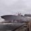The 27th Littoral Combat Ship, the future USS Nantucket, launches sideways into the Menominee River in Marinette, Wisconsin, on August 7.