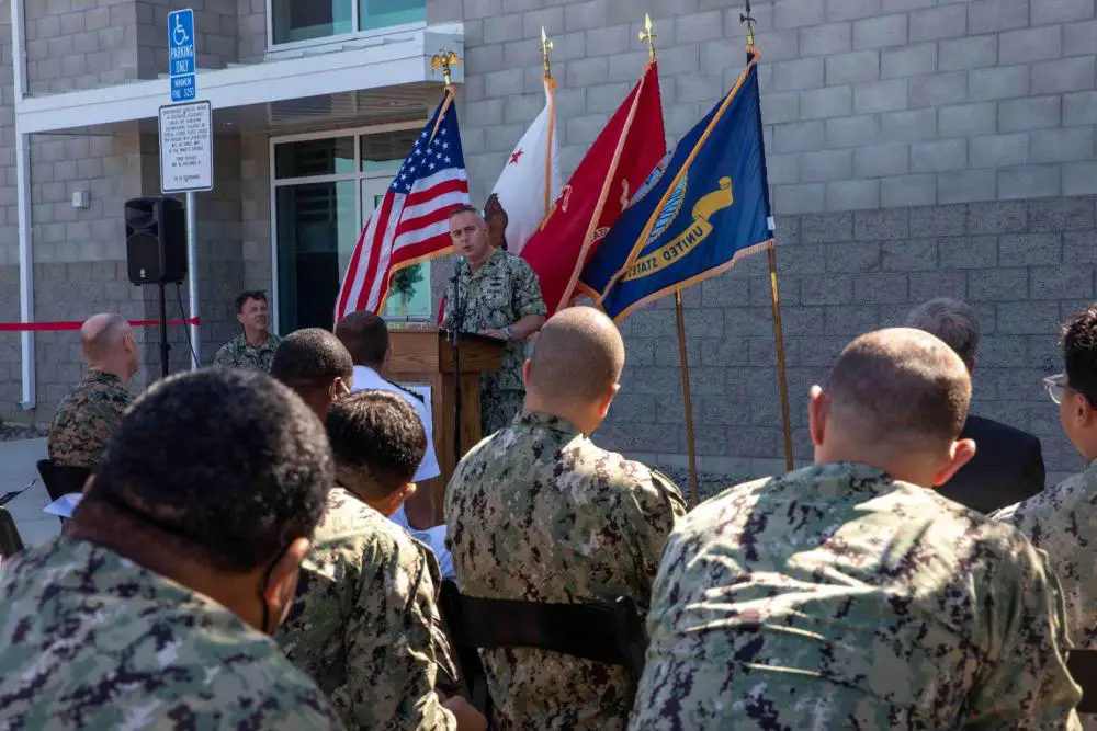 Capt. Dan Cobian, commanding officer of Expeditionary Warfare Training Group, Pacific (EWTGPAC), speaks during a ribbon cutting ceremony at the Assault Craft Unit (ACU) 5 complex onboard Marine Corps Base Camp Pendleton, Calif., to commemorate the completion of the new EWTGPAC Ship to Shore Connector (SSC) training facility.