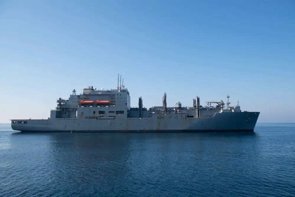 The dry cargo and ammunition ship USNS Matthew Perry (T-AKE 9) steams in the North Arabian Sea.
