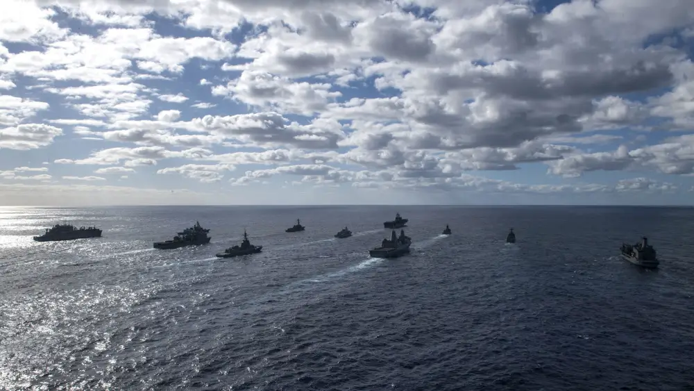 The ships of the USS America (LHA 6) Expeditionary Strike Group steam in formation during Talisman Sabre (TS) 21. This is the ninth iteration of Talisman Sabre, a large-scale, bilateral military exercise between Australian and the U.S. involving more than 17,000 participants from seven nations.
