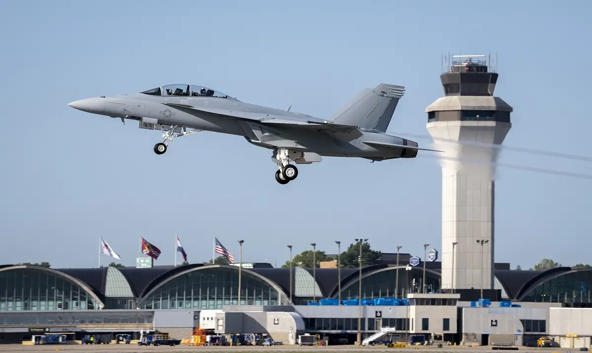 The first operational Block III F/A-18 Super Hornet lifts off over Lambert International Airport in St. Louis. (Photo by Boeing)
