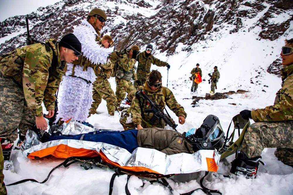 U.S. Army Soldiers assigned to Bravo Company, 2nd Battalion, 87th Infantry Regiment, 2nd Brigade Combat Team, 10th Mountain Division, and Chilean army soldiers assigned to 3rd Mountain Division, conduct a mock-rescue operation in Portillo, Chile Aug. 27, 2021. 