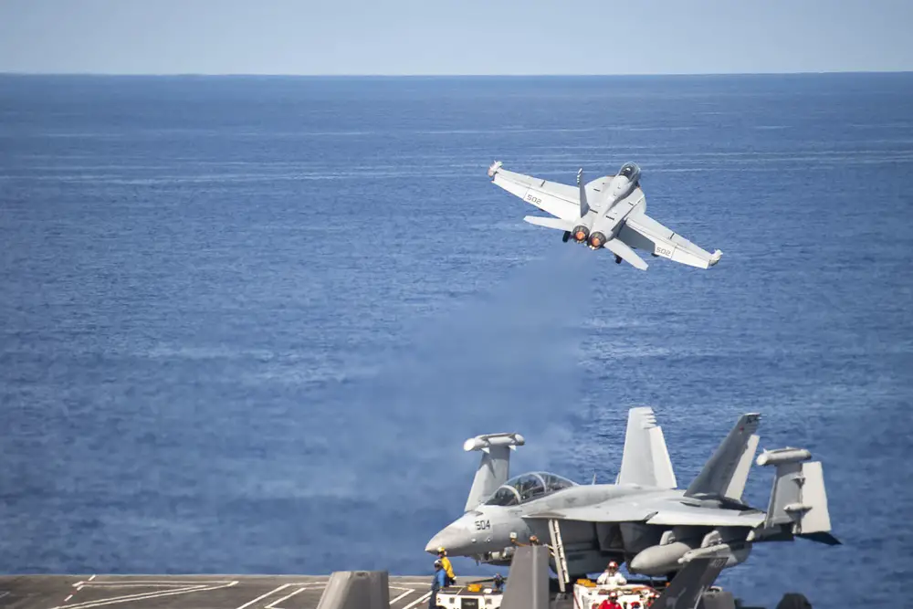 An EA-18G Growler, assigned to the “Gauntlets” of Electronic Attack Squadron (VAQ) 136, launches off the flight deck of Nimitz-class aircraft carrier USS Carl Vinson (CVN 70).