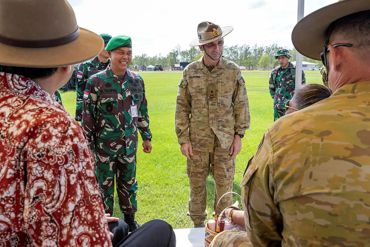 Deputy Territorial Assistant of Kodan I Chief of Staff, Major General Marga Taufiq, SH, MH (left) and Commander 1st Division, Major General Jake Ellwood, DSC, AM speaks with honoured guests of the opening ceremony for Exercise Wirra Jaya 2021 at Robertson Barracks, NT.