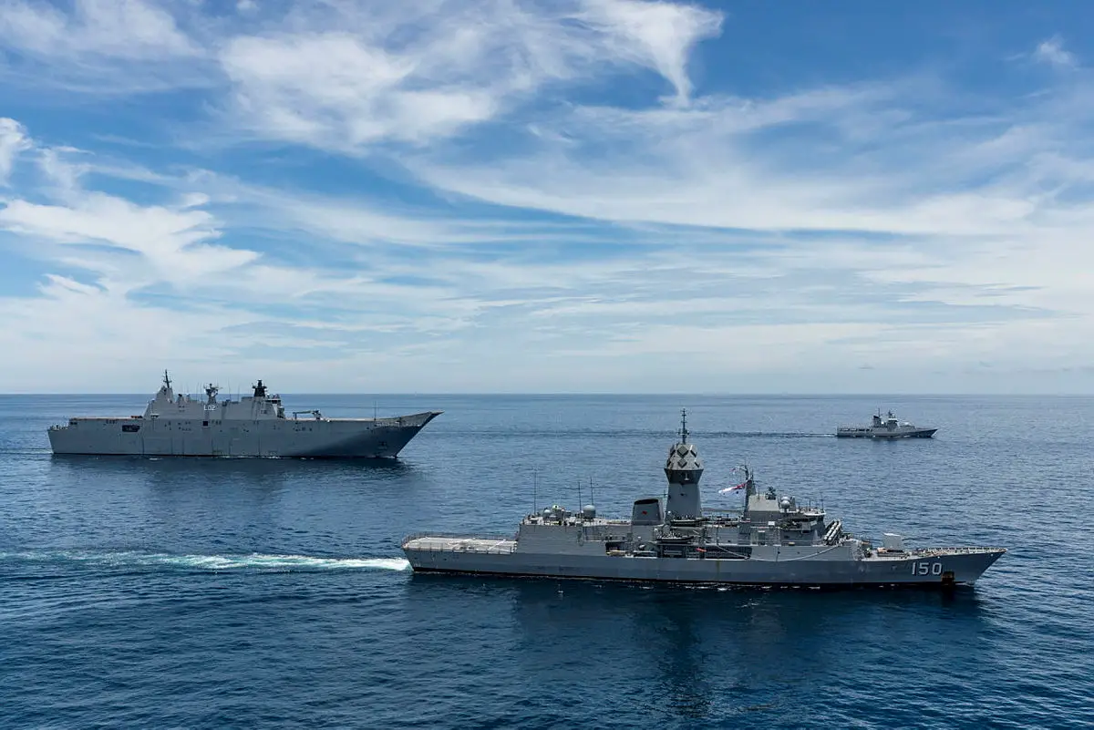 Royal Australian Navy ships Canberra and Anzac conduct a passage exercise with Royal Brunei Navy ship KDB Darulehsan during Indo-Pacific Endeavour 21.