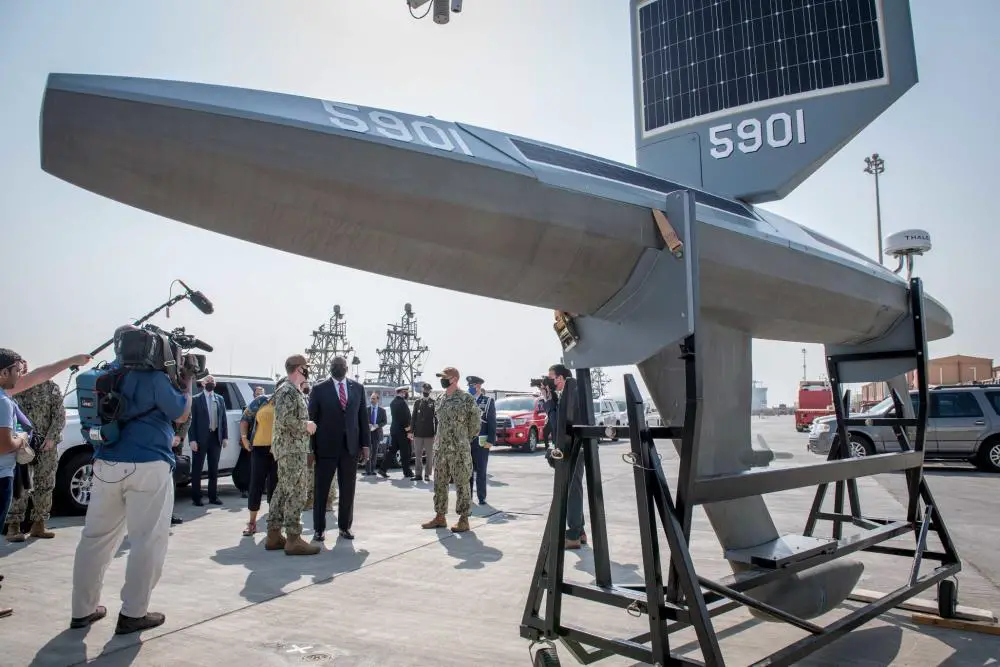 Secretary of Defense Lloyd J. Austin speaks to U.S. Navy personnel about the Saildrone Explorer unmanned surface vessel, attached to Task Force (TF) 59, at Naval Support Activity Bahrain, Nov. 21.