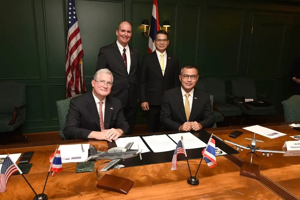 From left to right: Thomas Hammoor, president and chief executive officer of Textron Aviation Defense LLC, hosts the Royal Thai Air Force (RTAF) Air Marshal Pongsawat Jantasarn, Chairman of the RTAF Procurement Committee, for the signing of the official Thai contract procuring a fleet of 12 Beechcraft AT-6TH aircraft. Witnessing the contract signing are Thomas Webster, Textron Aviation Defense regional sales director for Asia Pacific, and RTAF Air Chief Marshal Chanon Mungthanya.