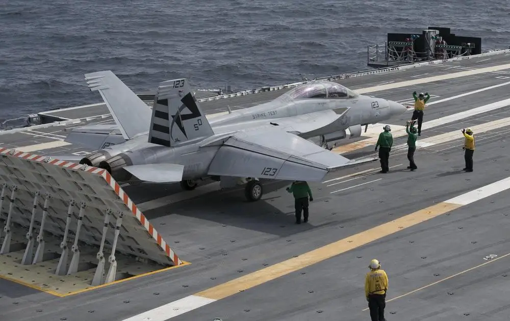 Sailors from USS Gerald R. Ford’s (CVN 78) air department load an F/A-18F Super Hornet, assigned to Air Test and Evaluation Squadron (VX) 23 piloted by Lt. Cmdr. Jamie “Coach” Struck, onto the electromagnetic aircraft launching system (EMALS)