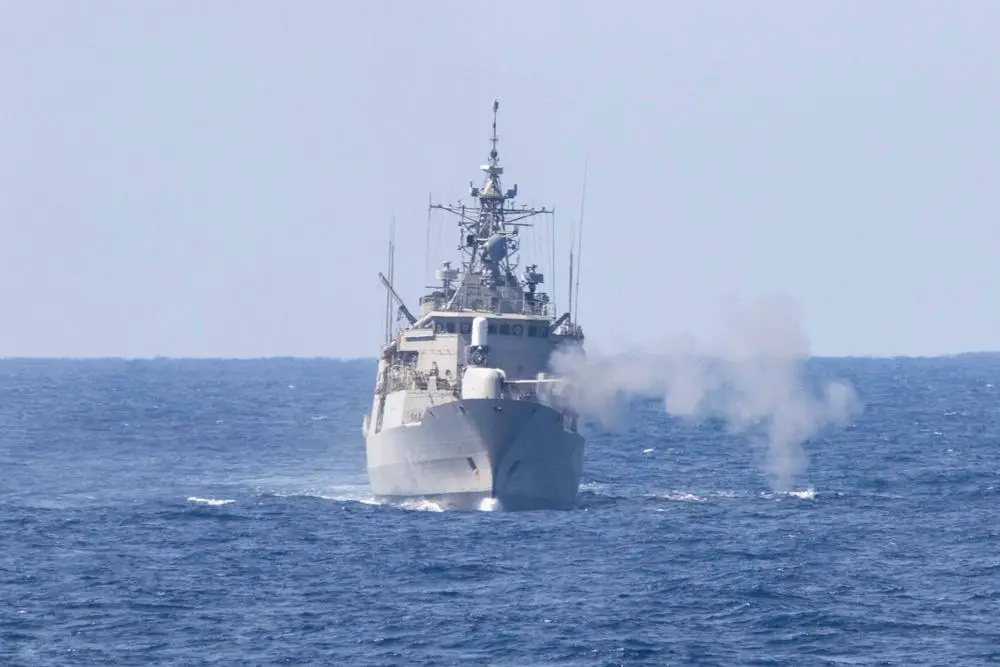The Hellenic Navy Hydra-class frigate HS Psara (F 494) fires its 5-inch gun during a live-fire exercise with the Arleigh Burke-class guided-missile destroyer USS Mitscher (DDG 57), March 12, 2021. 