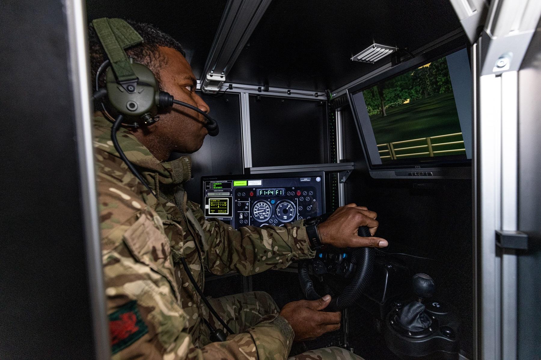 Troops from the Royal Welsh utilise the Combined Arms Tactical Trainer (CATT) in Sennelager. The CATT is an indoor virtual simulator training facility. 
