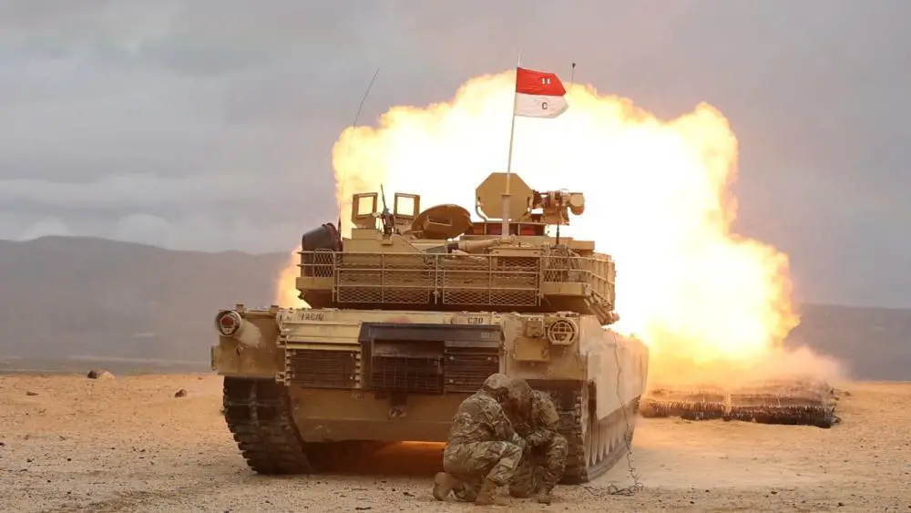 An M1A2 Abrams SEP V2 main battle tank, assigned to Cold Steel Troop, 1st Squadron, 11th Armored Cavalry Regiment, fires a M865 target practice cone stabilized discarding sabot with tracer on December 9, 2021, at the National Training Center and Fort Irwin training area.