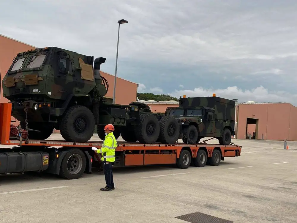 Another line haul truck arrives at Leghorn Army Depot, Italy, carrying Army Prepositioned Stock-2 vehicles shipped from a 405th Army Field Support Brigade APS-2 worksite north of the Alps to Army Field Support Battalion Africa’s APS-2 worksite south of the Alps.