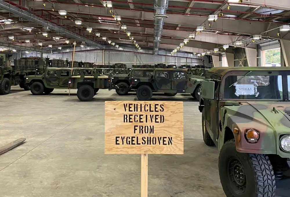 Army Prepositioned Stock-2 vehicles shipped from Army Field Support Battalion Benelux’s APS-2 worksite in Eygelshoven, Netherlands, to Army Field Support Battalion Africa’s APS-2 worksite in Livorno, Italy, are staged at one of the battalion’s warehouse facilities. 