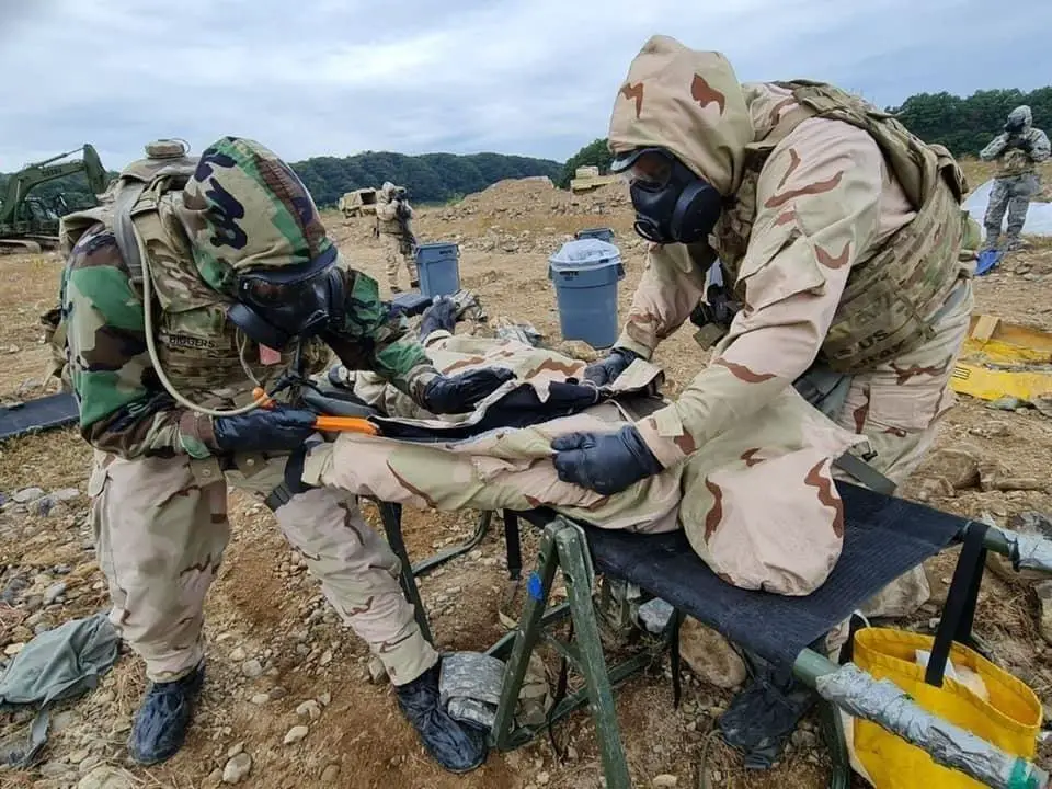 oldiers from the 92nd Chemical Company's 2nd Platoon decontaminate an armored unit that was hit with a simulated chemical attack during Exercise Warrior Bulldog Strike. 