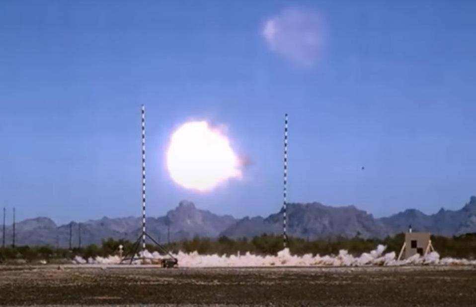 In airburst mode, the XM-1147 Advanced Multi-Purpose (AMP) round sprays the ground below with lethal shrapnel — note dust thrown up from impacts. 