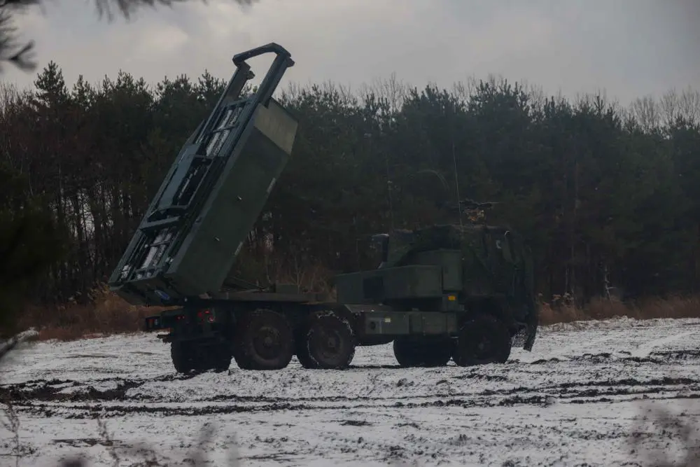 A High Mobility Artillery Rocket System with 3d Battalion, 12th Marines, executes a fire mission during Resolute Dragon 21 at Camp Hachinohe, Japan, Dec. 13, 2021. 