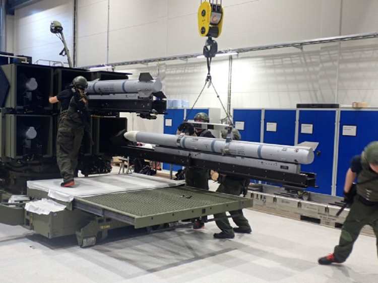 Norwegian Technical Support Staff loading AMRAAM missiles into the Australian Army’s NASAMS Mk 2 Canister Launcher as part of Factory Acceptance Testing in Kongsberg, Norway.