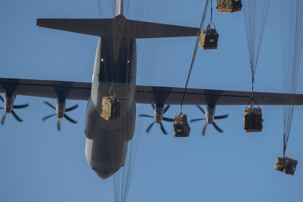Japan Ground Self-Defense Force's container delivery system bundles drop from a U.S. Air Force C-130J Super Hercules assigned to the 36th Airlift Squadron at Combined Arms Training Center Camp Fuji, Japan, Jan. 26, 2022, during Airborne 22. 