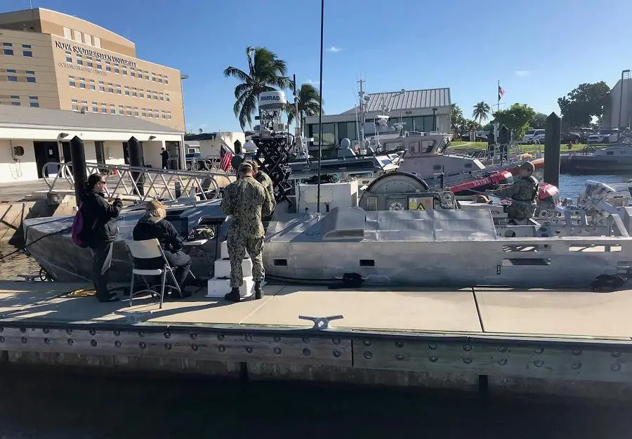  Sailors perform pre-mission checks on the Unmanned Influence Sweep System prior to an Operational Assessment mission off the coast of South Florida.