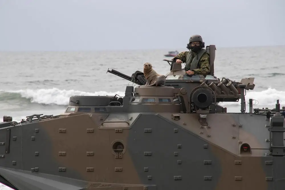A sea lion sits atop of a Japan Ground Self-Defense Force (JGSDF) assault amphibious vehicle assigned to 2nd Amphibious Rapid Deployment Regiment after conducting waterborne operations during bilateral amphibious assault training as part of exercise Iron Fist 2022 at White Beach, Marine Corps Base Camp Pendleton, California