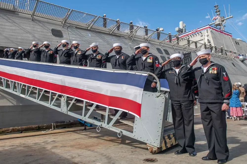  Sailors assigned to Independence-variant littoral combat ship USS Savannah (LCS 28) man the rails during Savannah's commissioning ceremony.