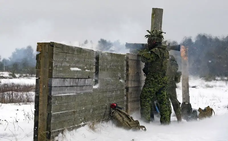 Canadian soldiers from the enhanced Forward Presence Battle Group Latvia fire an Carl Gustaf recoilless rifle during a practice range at Camp Adazi.