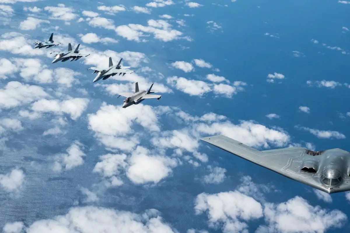 A U.S. Air Force B-2 Spirit from Whiteman Air Force Base, Mo., flies in formation with a Royal Australian Air Force F-35A Lightning IIs, two EA-18 Growlers, two RAAF F/A-18F Super Hornets and two U.S. Air Force F-16C Aggressors from Eielson AFB, Alaska, during a training mission in the Indo-Pacific region, March 23, 2022. 