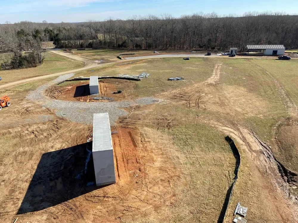 Elevated platforms and storage buildings are being constructed as part of a U.S. Army Corps of Engineers project to build a multi-use helicopter training facility at Fort Campbell, Kentucky, Dec. 7, 2021.