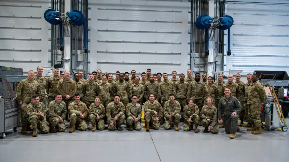 Members from the 48th Fighter Wing gather to celebrate the opening of the first F-35A Lightning II support facility at Royal Air Force Lakenheath, England, March 17, 2022.