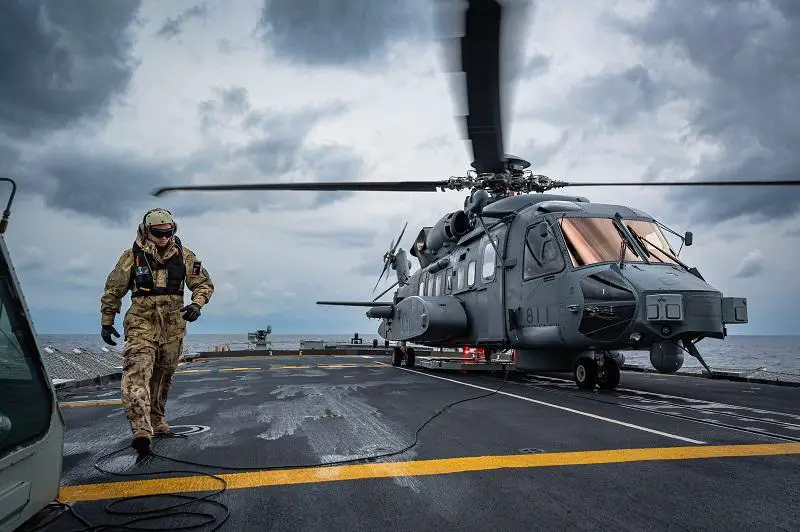 A CH-148 Cyclone helicopter, call sign Strider land on the flight deck of HMCS MONTREAL for flight operation training during Operation REASSURANCE in the Mediterranean Sea