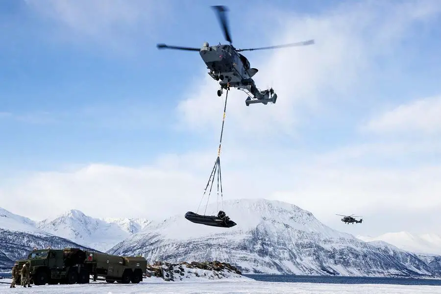 Commando Wildcat helicopters work alongside Royal Marines in the Arctic